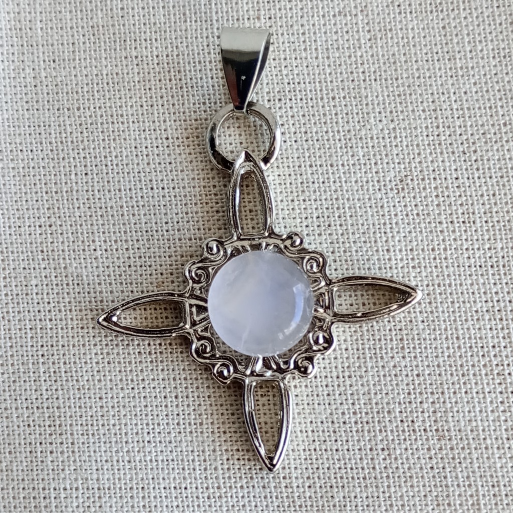 Dije nudo de bruja con piedra rolada
